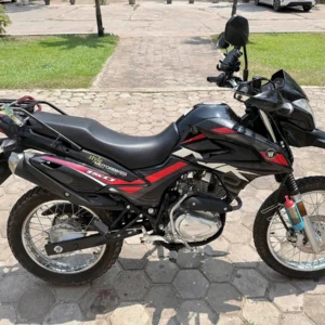 haojue nk 150cc dirt bike for rent in laos with a side view