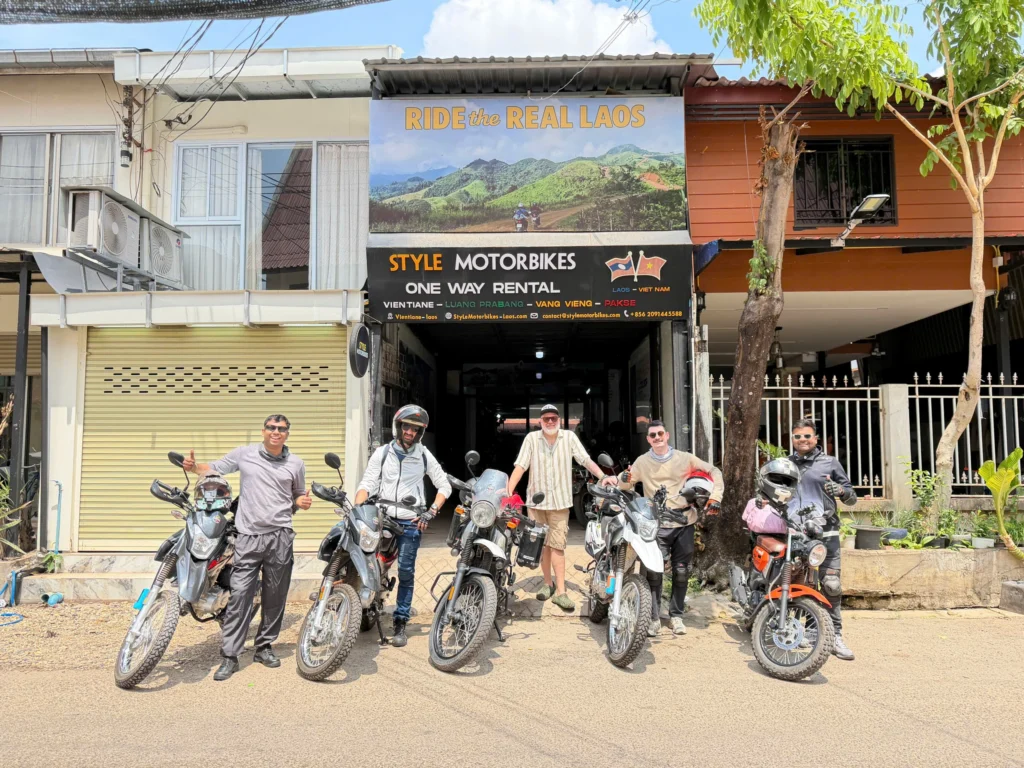 vientiane shop with 5 customers and bikes outside